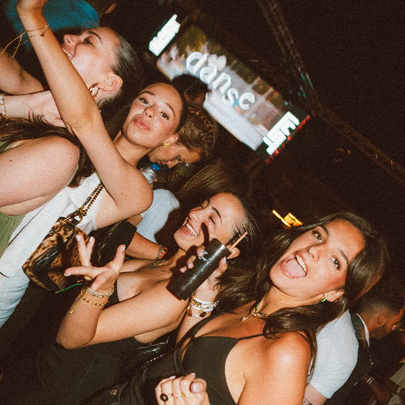 Female friends dancing and posing for photo Lust in Rio